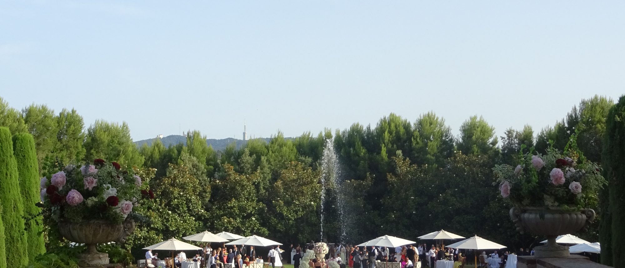 Ceremony by the fountain seen from the villa terrace
